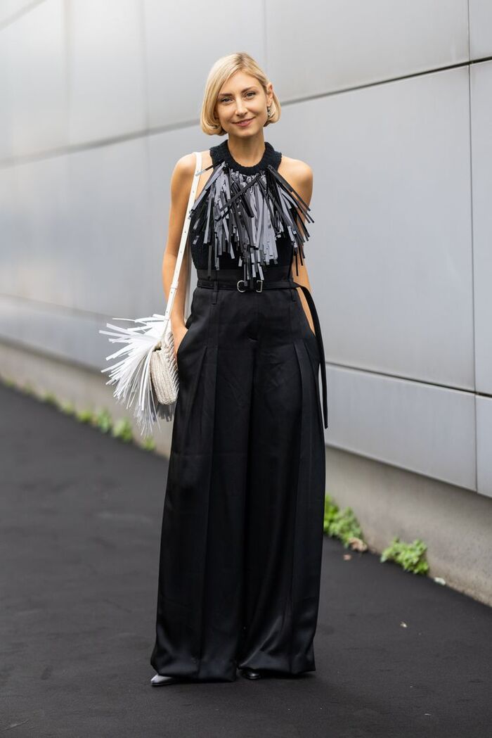 Top elegante de flecos